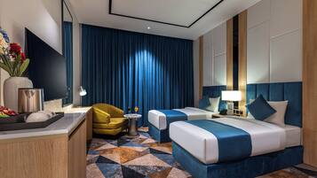 Deluxe kamer, 1 twee- of 2 eenpersoonsbedden | Een strijkplank/strijkijzer, gratis wifi