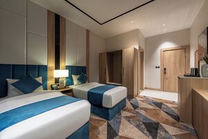 Habitación Deluxe con 1 cama doble o 2 individuales | Tabla de planchar con plancha y wifi gratis