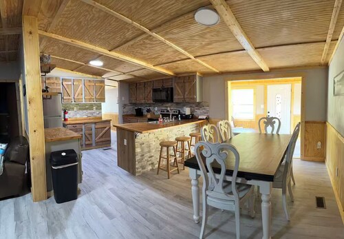 Lake Front Property with a gentle path to a private dock and lake. 3bed 2 bath