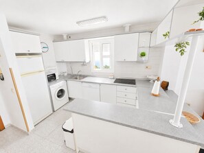 Coffee/tea maker, fridge, microwave, dishwasher