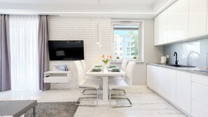 Apartment (26E) | Private kitchen | Fridge, stovetop, electric kettle, cookware/dishes/utensils
