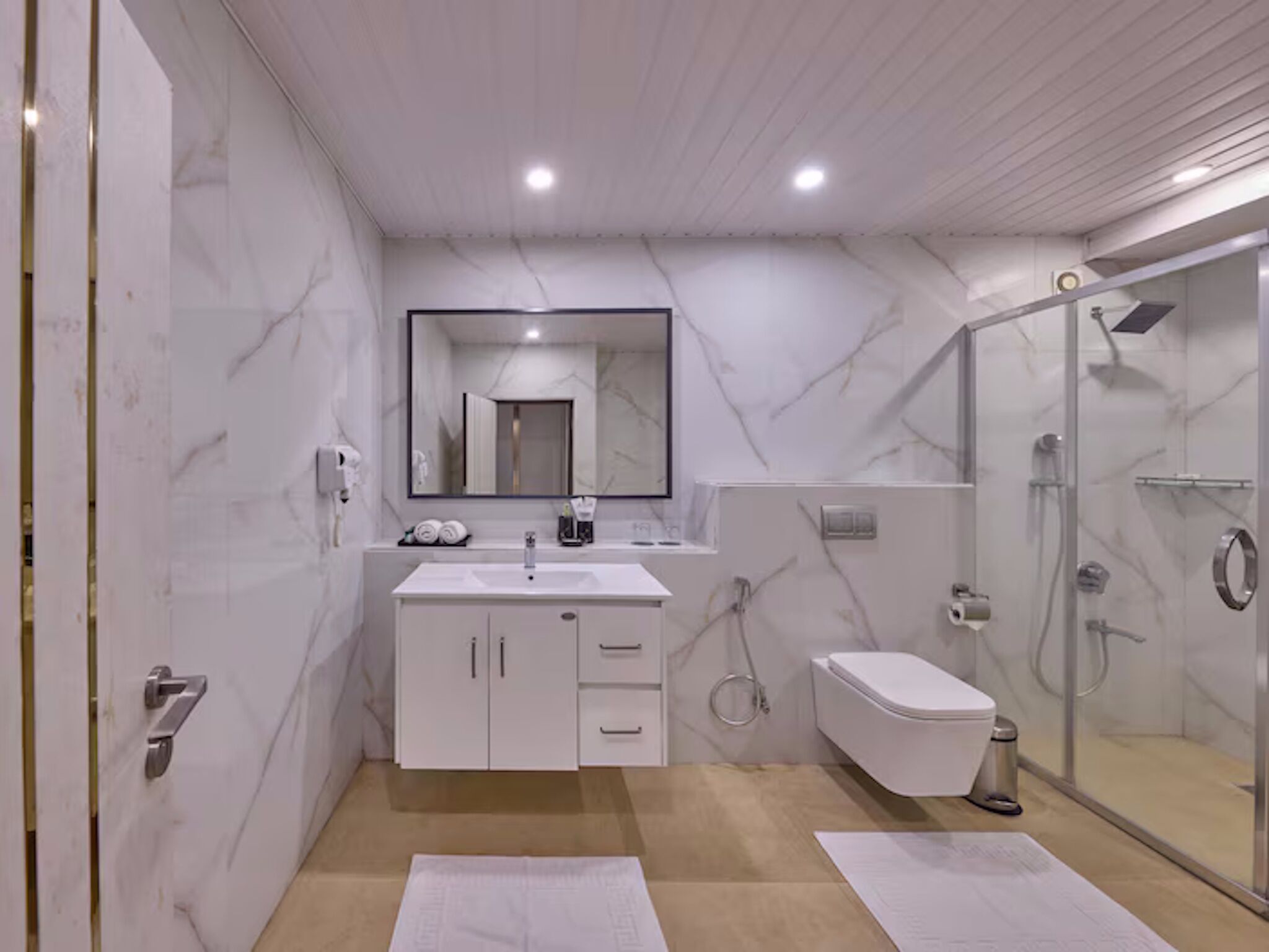 Shower, free toiletries, hair dryer, slippers
