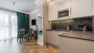 Classic Studio, Balcony | Private kitchenette | Fridge, electric kettle
