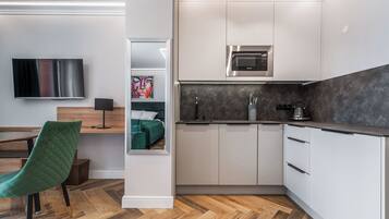 Classic Studio, Balcony | Private kitchenette | Fridge, electric kettle