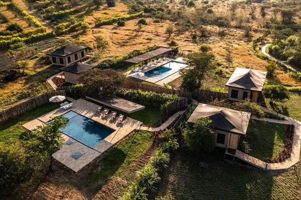 2 outdoor pools, pool umbrellas, pool loungers