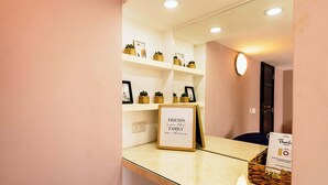 A reception area with a framed sign that reads "FRIENDS are the FAMILY we choose."