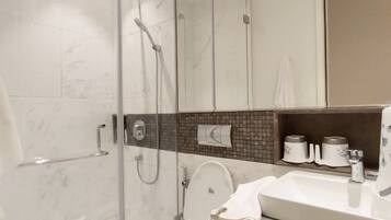 Shower, towels, soap, toilet paper