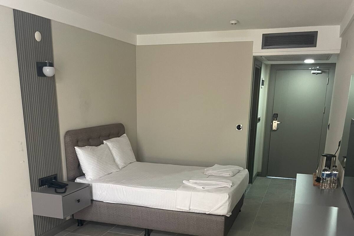 Economy Double Room, Beach View | In-room safe, laptop workspace, blackout drapes, soundproofing