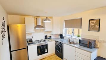 Comfort Townhome | Blackout drapes, iron/ironing board, free WiFi