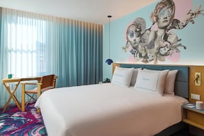 Hypo-allergenic bedding, free minibar items, desk, laptop workspace