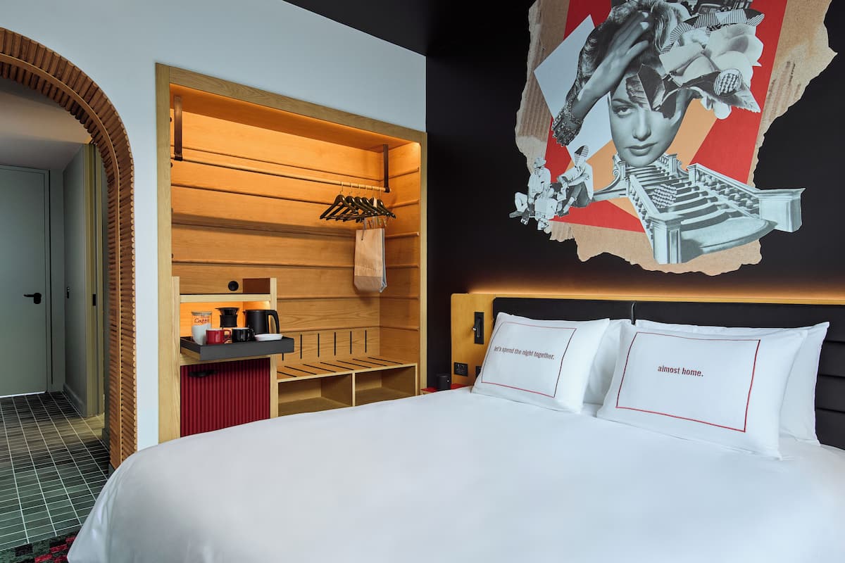 Hypo-allergenic bedding, free minibar items, desk, laptop workspace