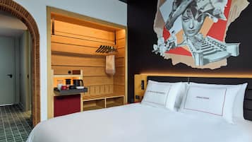 Hypo-allergenic bedding, free minibar items, desk, laptop workspace