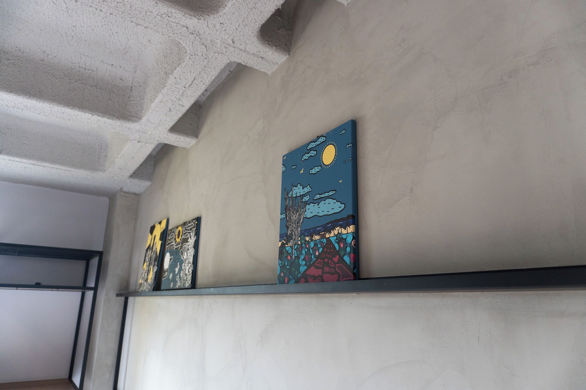 Artwork on a wall in a room.
