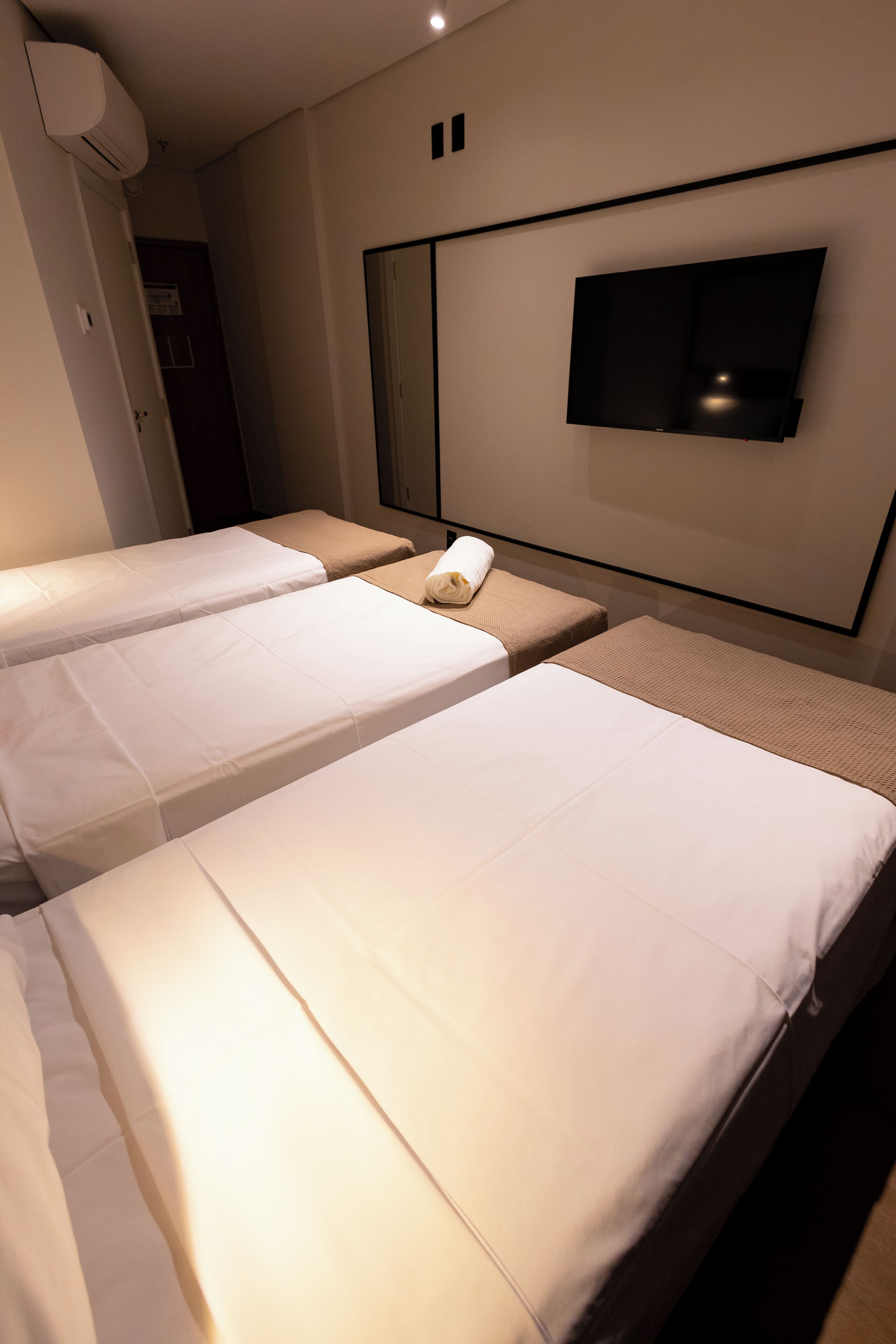 Quarto superior, 3 camas de solteiro