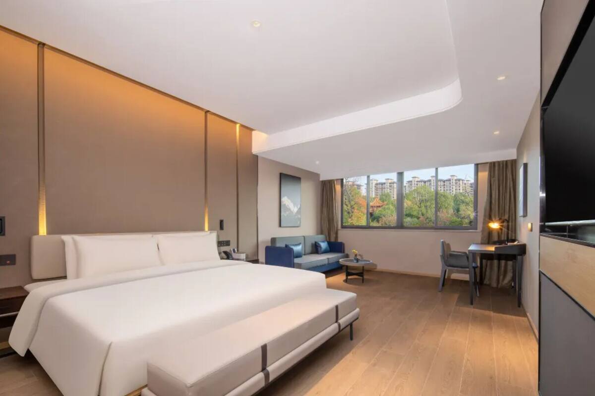 ห้องเอ็กเซกคิวทีฟ, เตียงคิงไซส์ 1 เตียง | มินิบาร์ฟรี, ผ้าม่านกันแสง, Wi-Fi ฟรี, ผ้าปูที่นอน