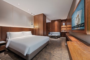 Habitación ejecutiva, 1 cama de matrimonio grande | Minibar con artículos gratuitos y cortinas opacas