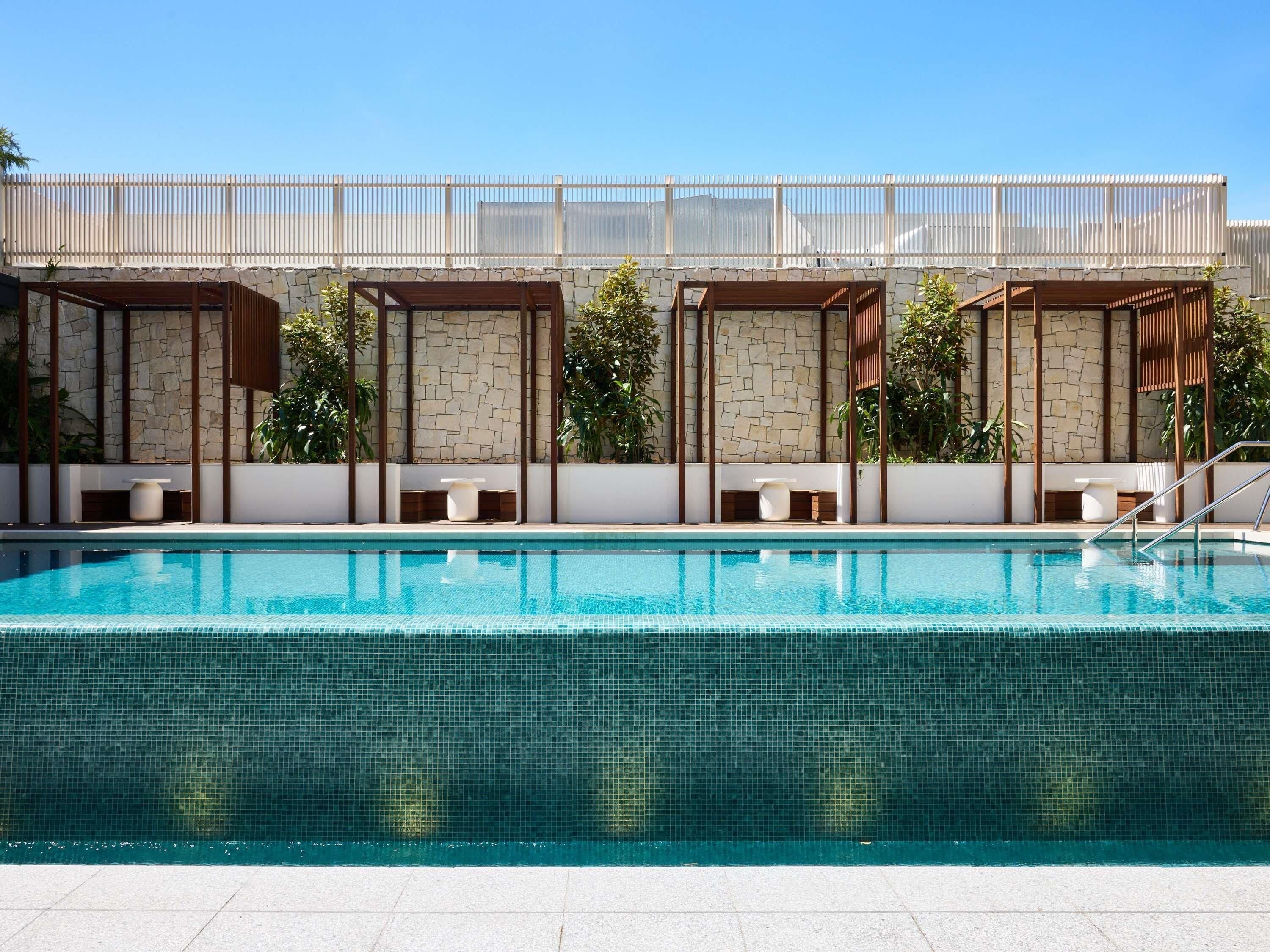 Outdoor pool, open 7:00 AM to 8:00 PM, pool umbrellas, pool loungers