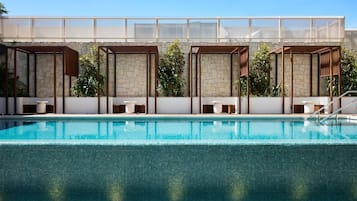 Outdoor pool, open 7:00 AM to 8:00 PM, pool umbrellas, pool loungers