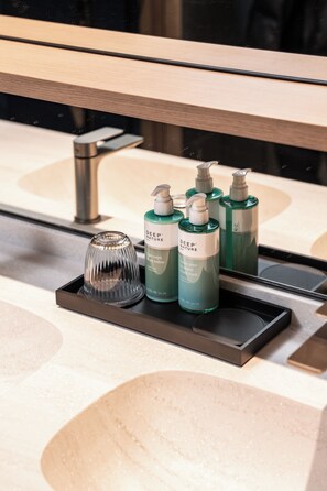 Eco-friendly toiletries, hair dryer, towels, soap