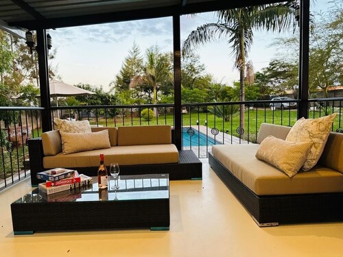 Charming 2-bedroom house in peaceful Harare with a Pool ,AC, WiFi & fitness room