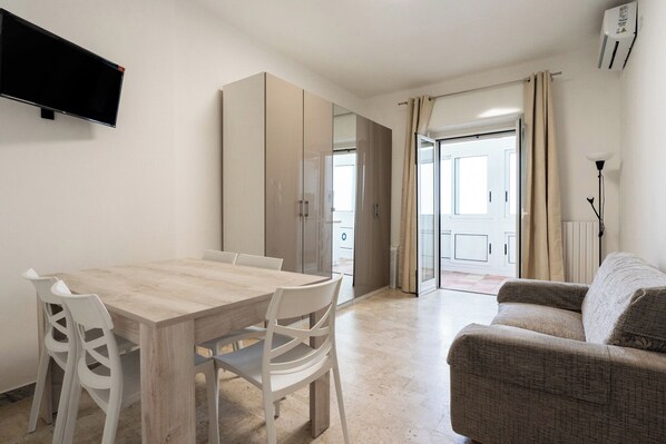 Appartement, 1 chambre | Coin séjour