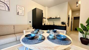 Appartement Familial | Coin séjour | Télévision à écran plat de 30 pouces avec chaînes numériques