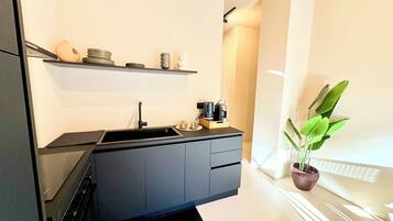 Family Apartment | Private kitchen | Fridge, espresso maker