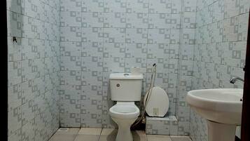 Standard Twin Room, City View | Bathroom | Shower, slippers, towels, soap