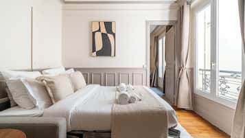 Appartement Deluxe, vue cour intérieure | Coin séjour