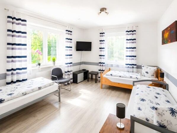 4 slaapkamers, een strijkplank/strijkijzer, wifi, beddengoed