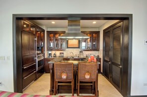 Fridge, coffee/tea maker, cookware/dishes/utensils