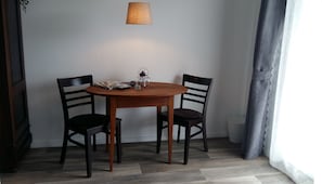 Comfort Double Room, Patio | In-room dining