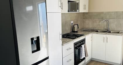 1 bedroom apartment with stunning mountainous and sunset views.