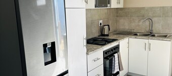 1 bedroom apartment with stunning mountainous and sunset views.
