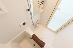 Hair dryer, bidet, towels, soap
