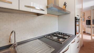Fridge, microwave, coffee/tea maker, highchair
