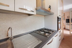 Fridge, microwave, coffee/tea maker, high chair