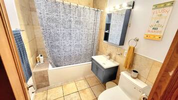 Hair dryer, towels, soap, toilet paper