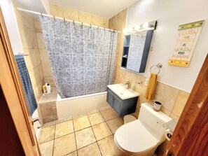 Hair dryer, towels, soap, toilet paper