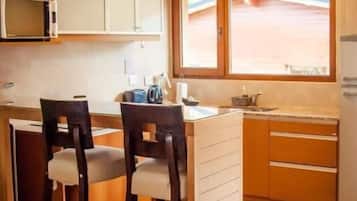 Fridge, microwave, cookware/dishes/utensils