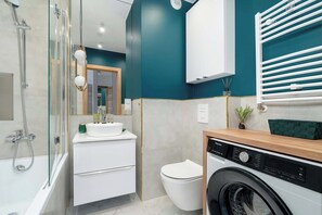 Shower, hair dryer, towels