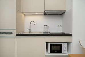 Fridge, microwave, stovetop, electric kettle