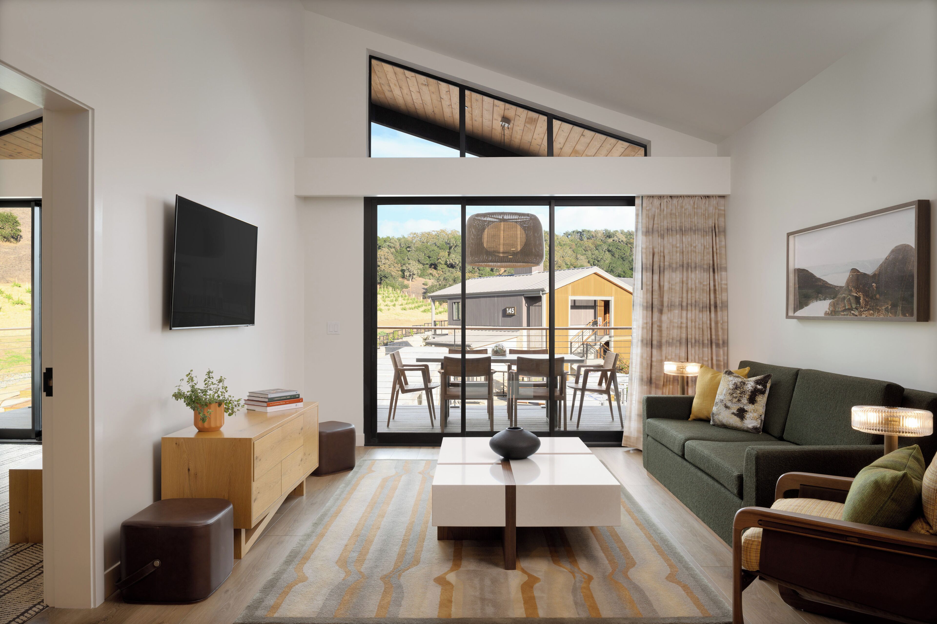 Suite, 1 Bedroom (Vaulted) | Living area | 48-inch Smart TV with cable channels