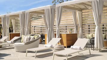 2 outdoor pools, open 7:00 AM to 10:00 PM, free cabanas, pool umbrellas