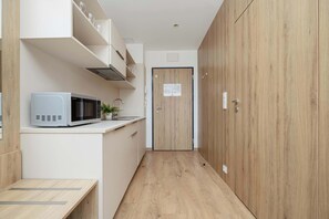 Fridge, microwave, stovetop, cookware/dishes/utensils