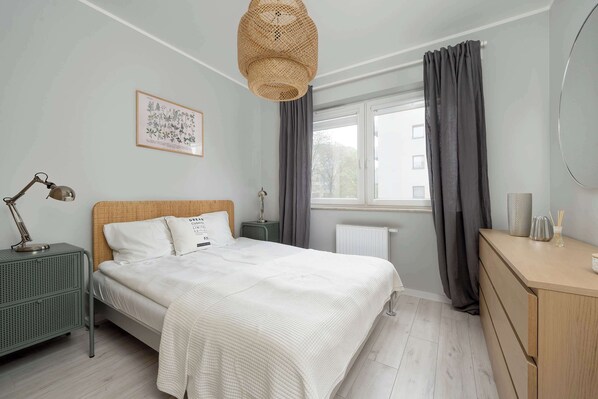 1 bedroom, desk, iron/ironing board, travel crib