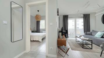 1 bedroom, desk, iron/ironing board, travel crib