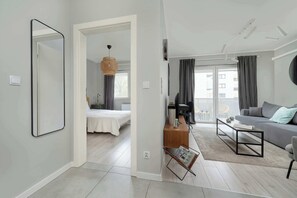 1 bedroom, desk, iron/ironing board, travel crib