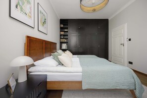 1 bedroom, desk, iron/ironing board, travel crib