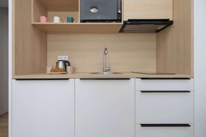 Fridge, microwave, stovetop, cookware/dishes/utensils